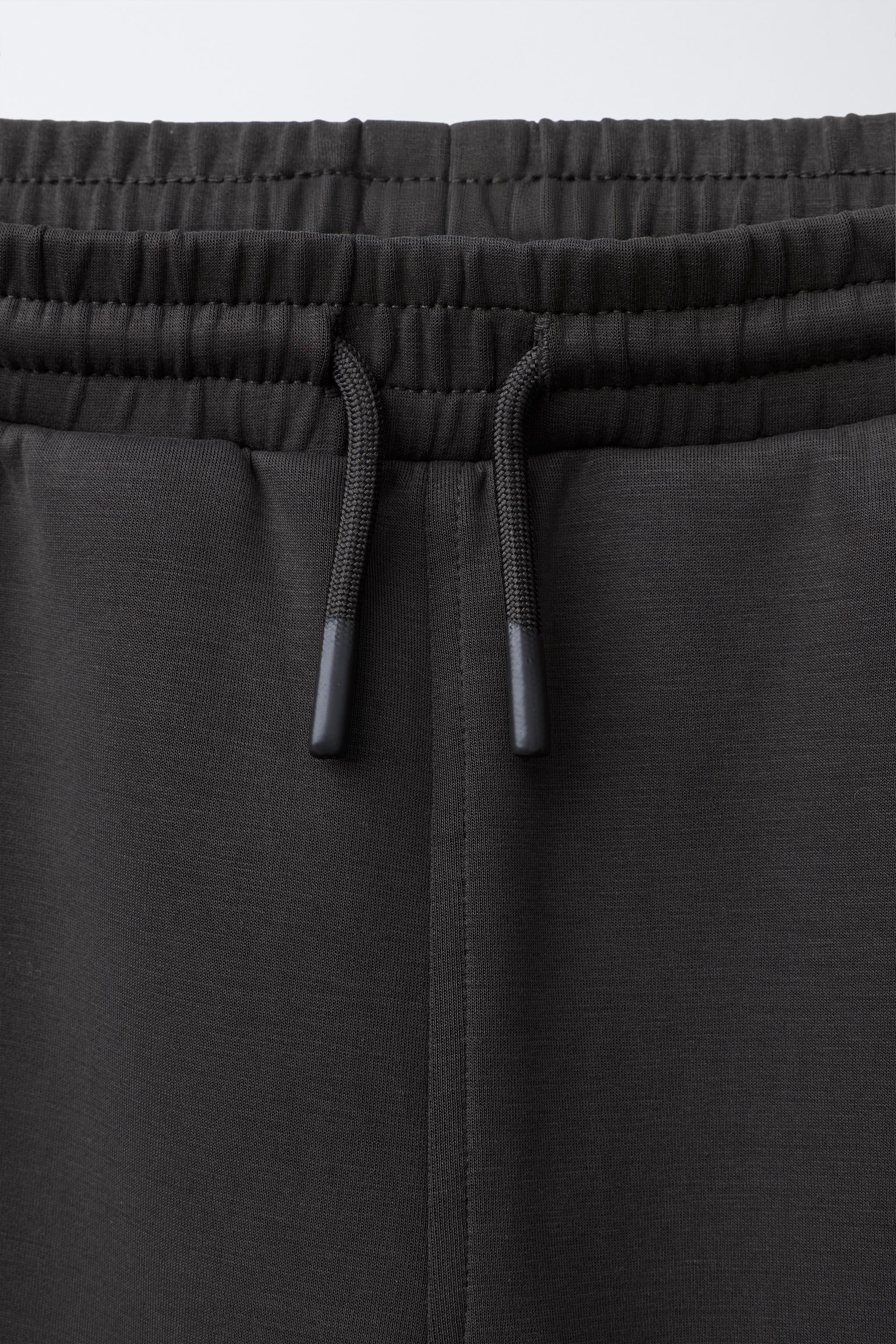 REFLECTIVE TEXT SPORTY JOGGER PANTS